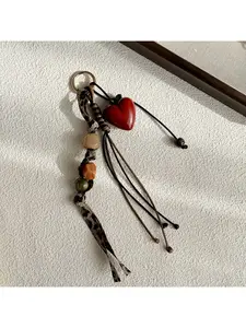 Vintage simple and versatile everyday Maillard brown series bag charm with leopard print braided rope and heart-shaped keychain, handmade beaded bag accessory