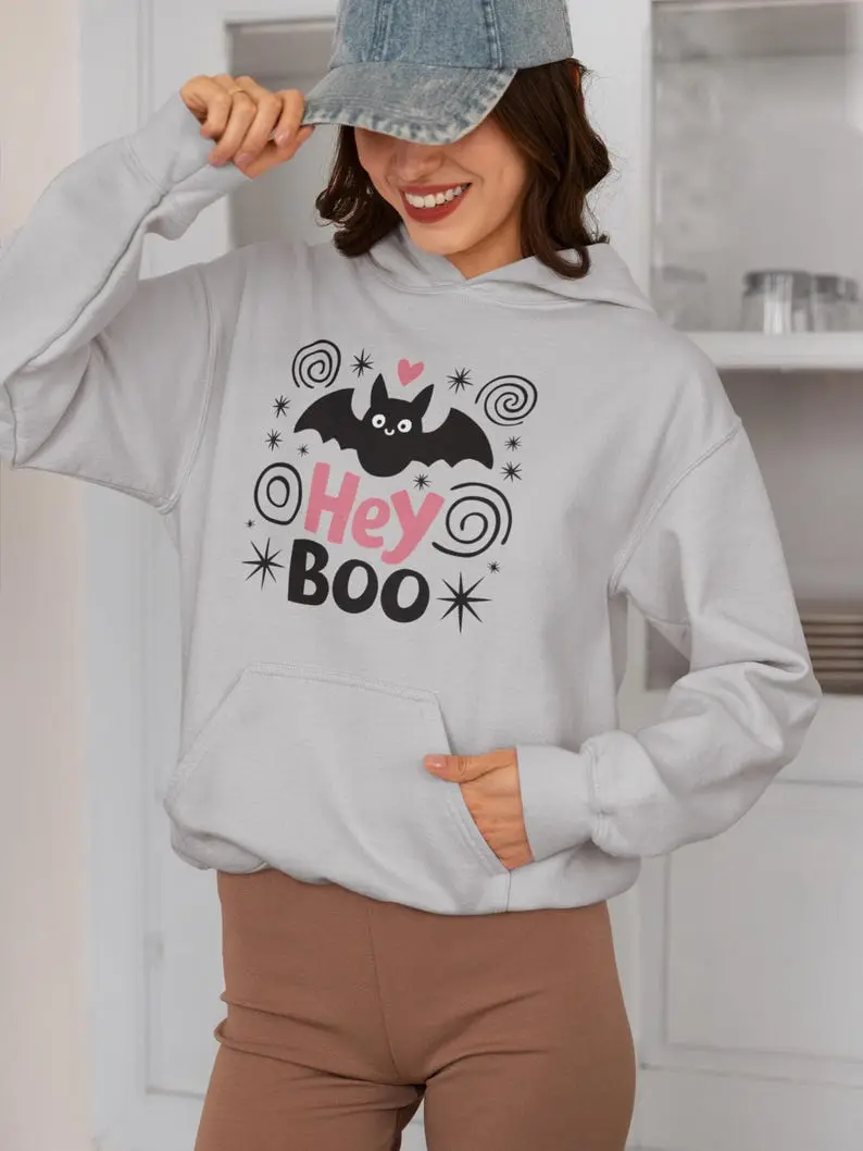 Hey Boo Halloween Hoodie – Spooky Season Sweatshirt, Cute Halloween Gift, Cozy Fall Unisex Hooded Sweatshirt for Halloween Lovers