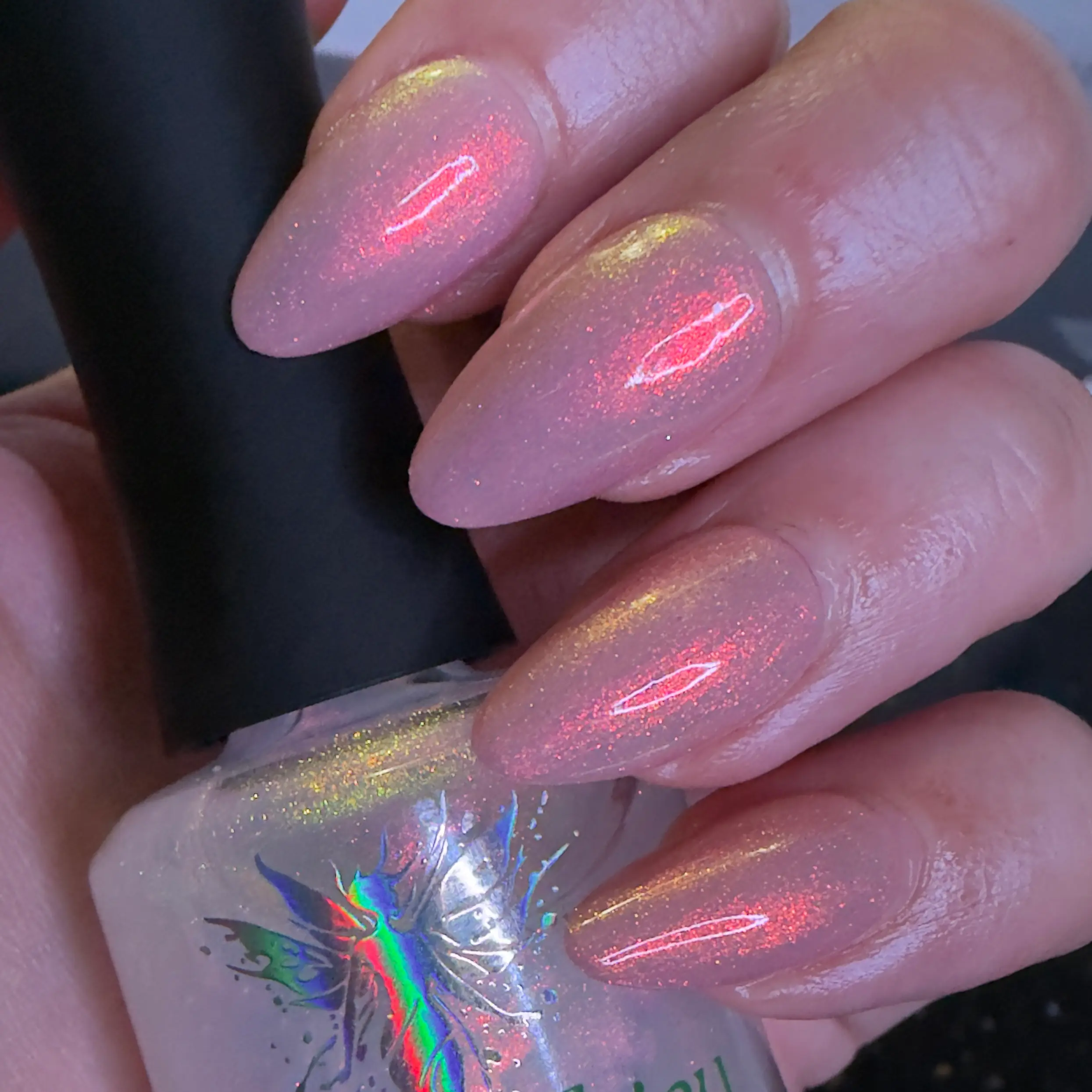 Infatuation | An Aurora Shimmer Topper That Shifts From Red to Orange to Gold to Green
