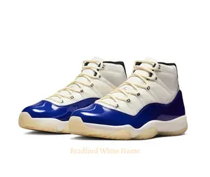 Premium white mesh with that iconic blue patent detail. A total grail Sneakers