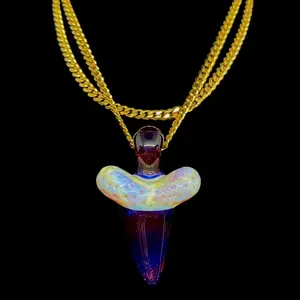 Sculpted lemon shark tooth pendant