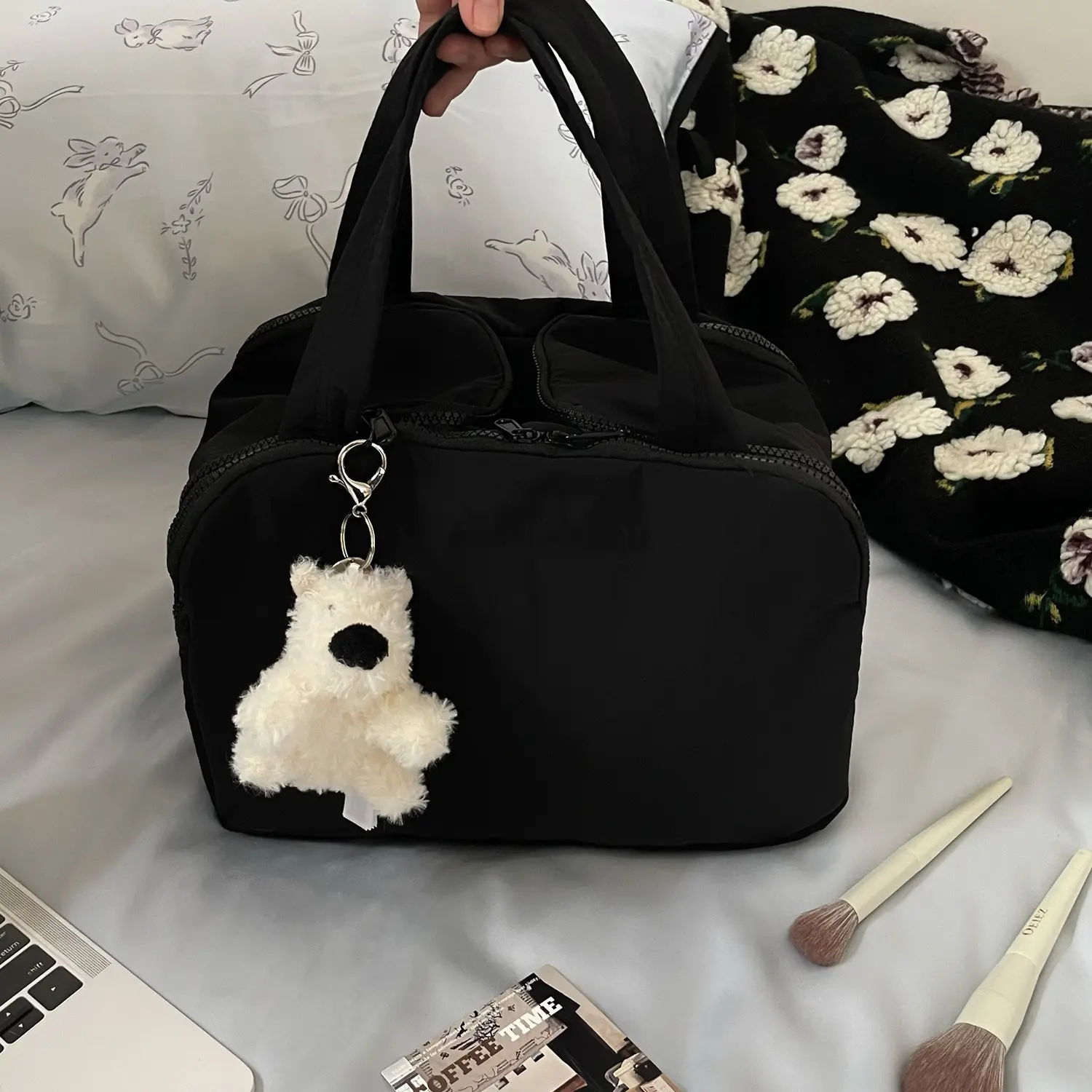 Black four open makeup bag