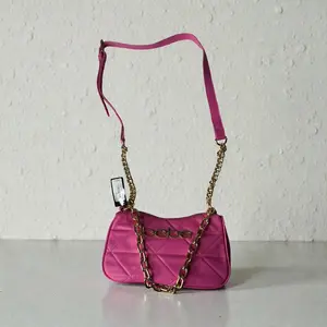 Bebe Pink Quilted Crossbody Bag with Golden Chain Strap and Adjustable Strap for Everyday Use