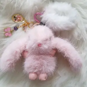 LipsGal Cosmetics LLC Big Faux Fur Bunny Keychain with Pink Bow and Gold Charm for Stylish Accessories Soft Cuddly Faux Fur Design