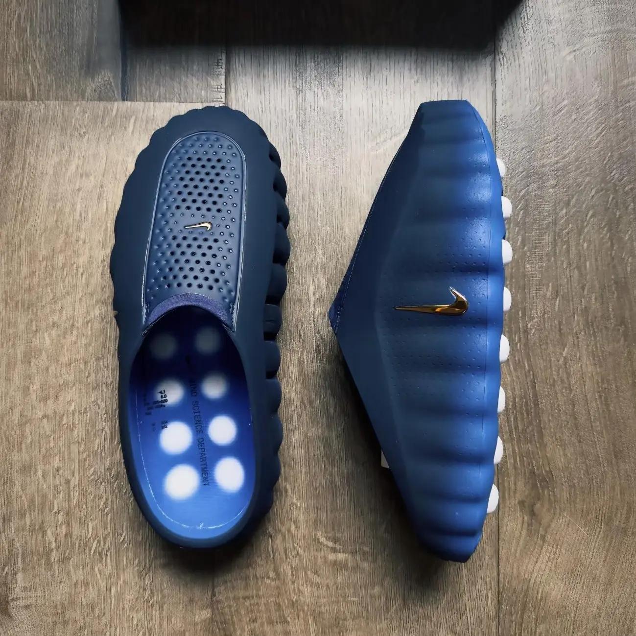 Rubber foam closed‑toe slide slippers navy blue white massage bump insole, perforated upper slip‑on cushioned non‑slip indoor outdoor footwear