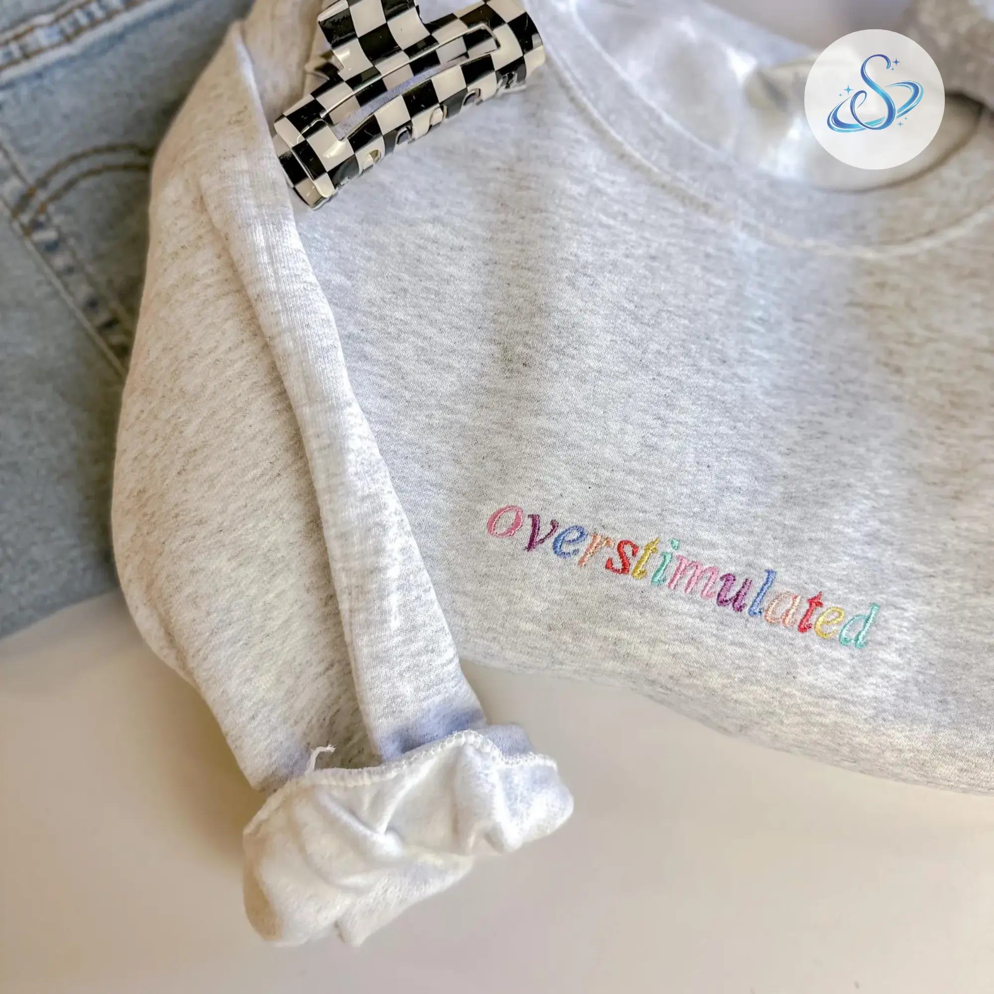 Overstimulated Embroidered Crewneck Sweatshirt, Minimalist Rainbow Text Pullover, Funny Cozy Statement Sweater for Women, Soft Casual Everyday Comfort Top