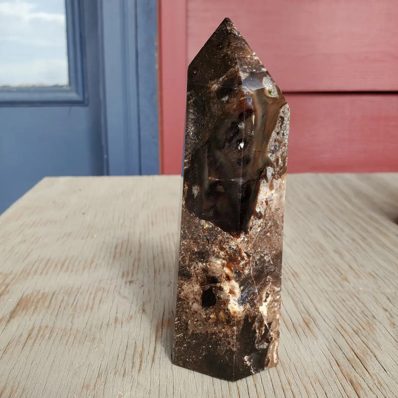 Natural polished Black Opal point