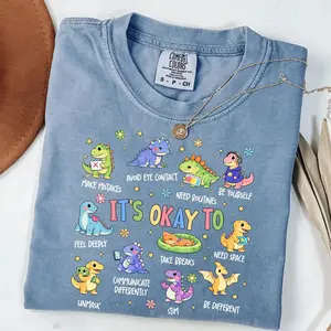Comfort Colors Autism Awareness Dinosaur T-Shirt It's Ok To Be Different Shirt, Autism Mom Shirts, SPED Teacher Neurodiversity Tee - Ahri Clothing