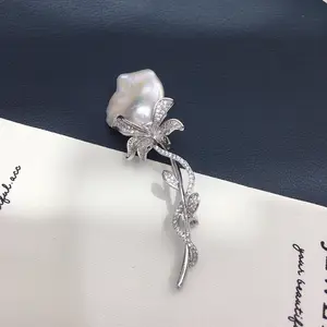 The Baroque Rose Bloom – A Fine Jewelry Brooch with Fishtail Pearl & Floral Motif
