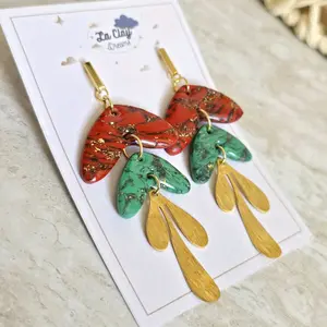 handmade polymerclay statement earrings feature a stunning marbled design, red and green with a golden accent. perfect for Christmas party
