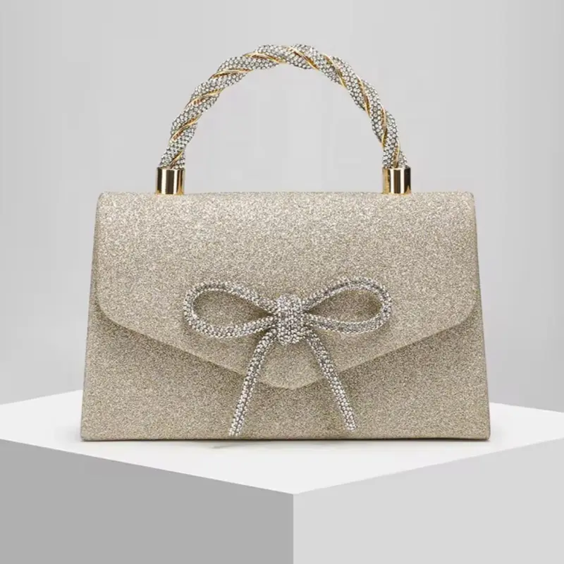 Women's Elegant Gold Glitter Handbag - Compact Design, Rhinestone Bow, Twisted Handle - Bow-Shaped Bridal Embellishment Handbag for Special Occasions, Bow-Shaped Women's Handbags, Bridal Women's Handbags