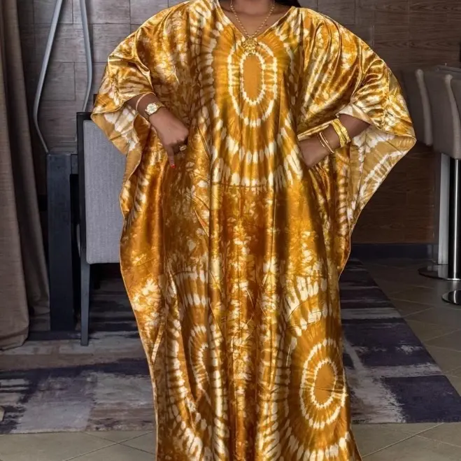 African Women's Kaftan in Golden Yellow with Circular Patterns and Long  Sleeves - TikTok Shop