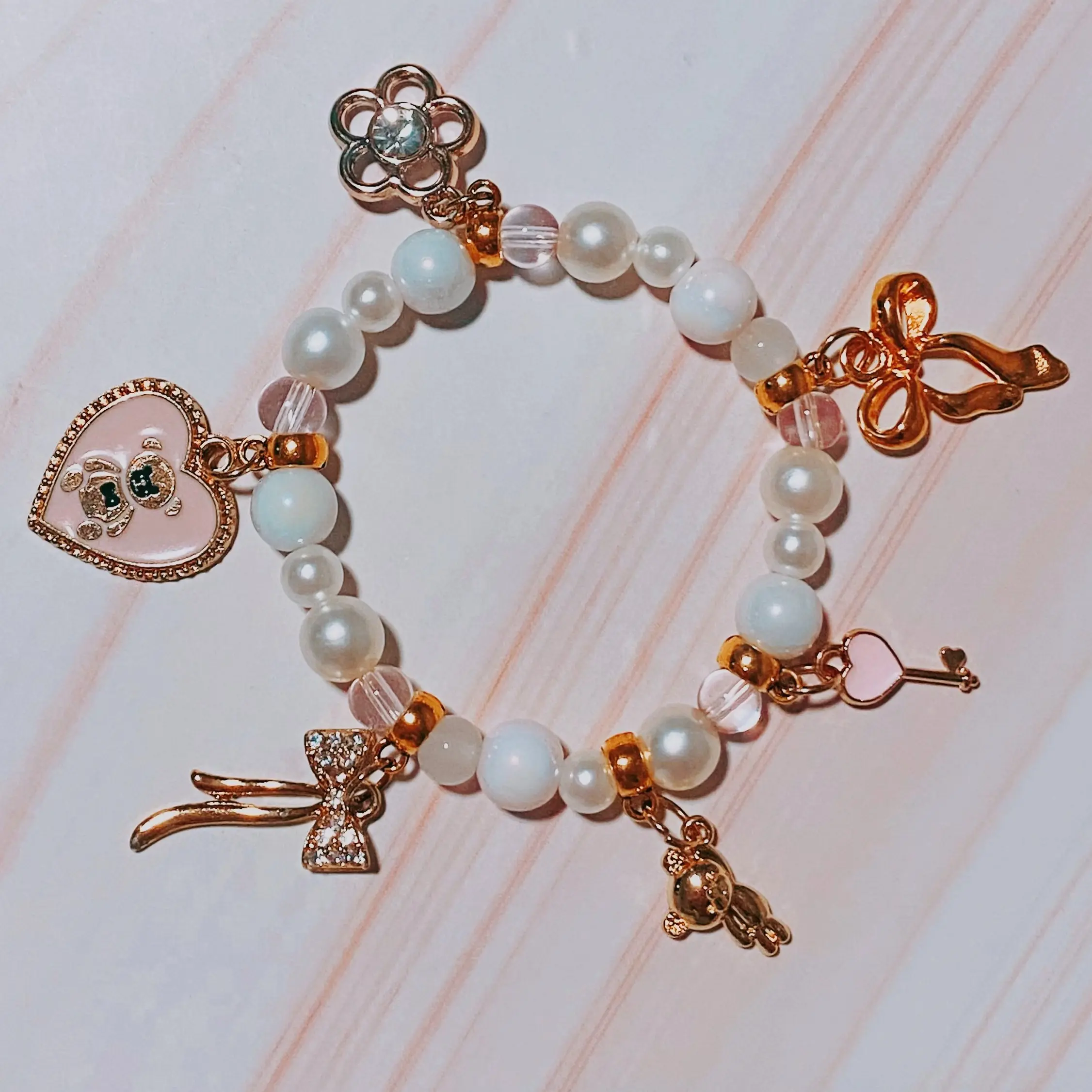 stretchy pink coquette teddy bear bracelet, stretch bracelet, one size beaded charm bracelet, pink y2k beaded bracelet, bear charms