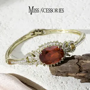 Oval Red Crystal Bangle | Layered CZ Halo Gold Tone | Viral Ruby Look Statement Bangle | Luxury Red Crystal Statement Bangle | Timeless Evening Wear Jewelry | Birthday/Valentine’s Gift Idea