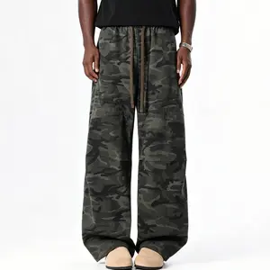 Men’s camouflage ultra-loose drawstring jeans; men’s camouflage loose wide-leg cargo pants. Summer denim long pants featuring a drawstring waist design and wide legs with a camouflage pattern. Street cargo pants with an elastic waistband, suitable for eve