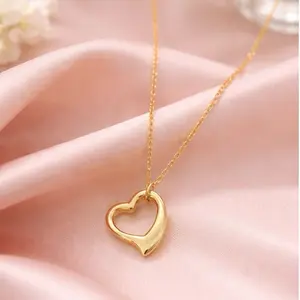 Stainless Steel Heart Pendant Necklace - Elegant Gold Tone Chain with Heart Shape Pendant for Women