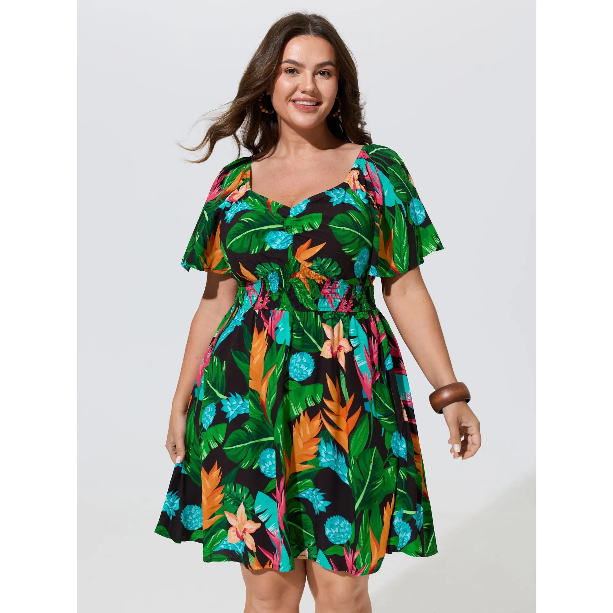 BloomChic Plus Size Tropical Floral Print Rayon Dress, Casual Resort Style with Short Flutter Sleeves, Smocked Waist, and Pockets, Smooth, Garment, Fabric