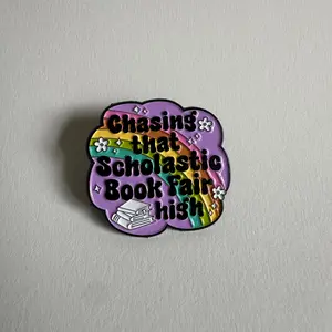 Chasing That Scholastic Book Fair High Enamel Pin, 1.3” x 1.3”