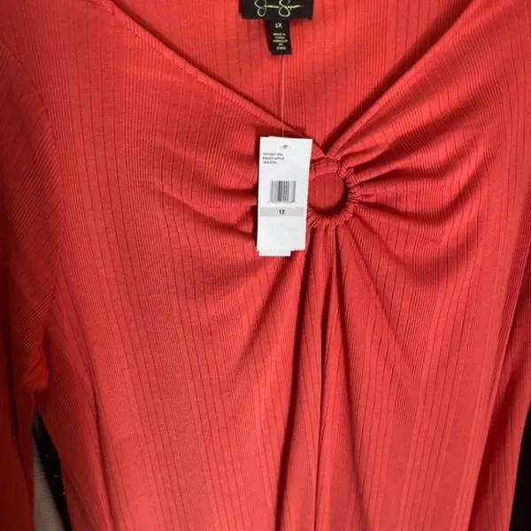 Coral colored blouse