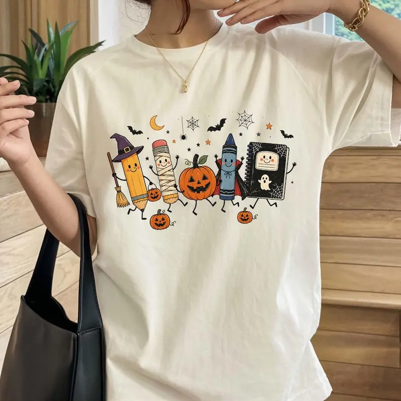 [Comfort Colors for Back To School] Halloween Teacher Shirt, Cute School Supplies Halloween Graphic Tee, Pencil Pumpkin Crayon Notebook Shirt, Spooky Teacher T-Shirt, Elementary Teacher Tee, Back to School Shirt, Fall Teacher Gift, Gift for Women