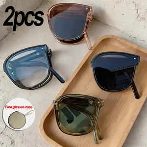 Unisex fashionable square folding glasses — lightweight, elegant round frames with decorative lenses; foldable design with a portable case for easy carrying. Colors: black, blue, brown, green. Korean–Japanese street style accessory for everyday use, stree