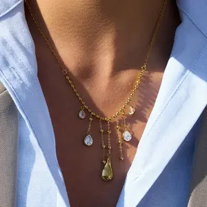 Emma's Heart | Liquid Glow Tassel - 18K Gold Plated Titanium Steel, Shimmering Zirconia Drop
