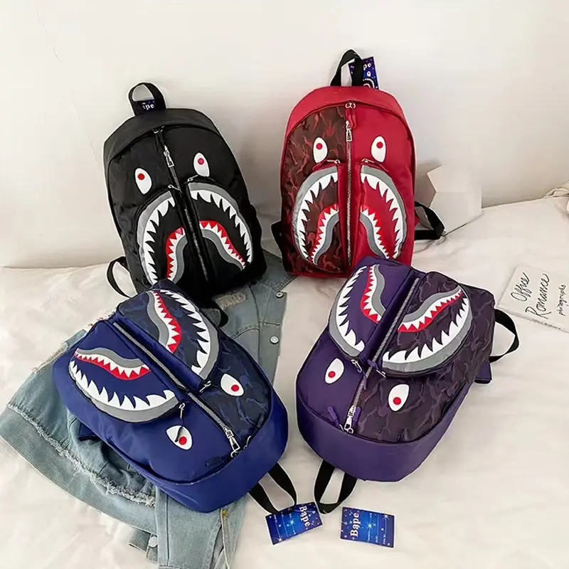 Shark “ugly-cute” new unisex backpack — large-capacity, trendy design; suitable for travel and students.