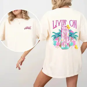 🍭⚡ "Livin’ on Alani Nu Cotton Candy" Graphic T-Shirt for Women & Men| Cute Energy Drink Aesthetic Tee| Oversized Y2K Streetwear Graphic Shirt| Soft Cotton Crewneck Summer Top| Trendy TikTok Viral Fashion Tee| Perfect Gift for Alani Lovers