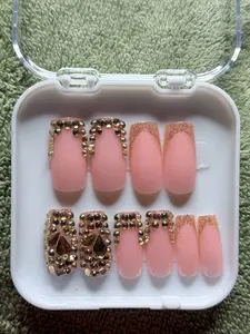 Soft glam pink press-on nails with luxury