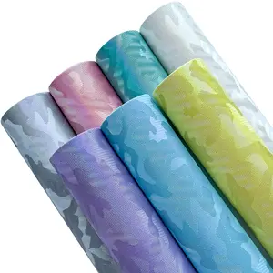 7-pack of 8x12-inch rainbow camouflage PU leather, ideal for DIY bows, earrings, keychains, necklaces, pendants, and crafts. Stocked in the U.S.