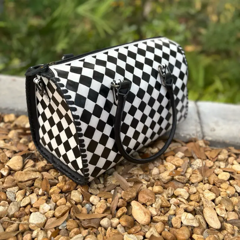 Large black and white checker genuine leather hand painted speedy bag. Crossbody strap included. 14x9x10”