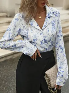 A blue and white ink floral print suit collar cut placket single-breasted loose oversize version long-sleeved shirt