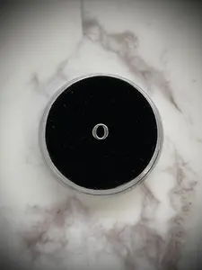 Silver “O” Tooth Gem