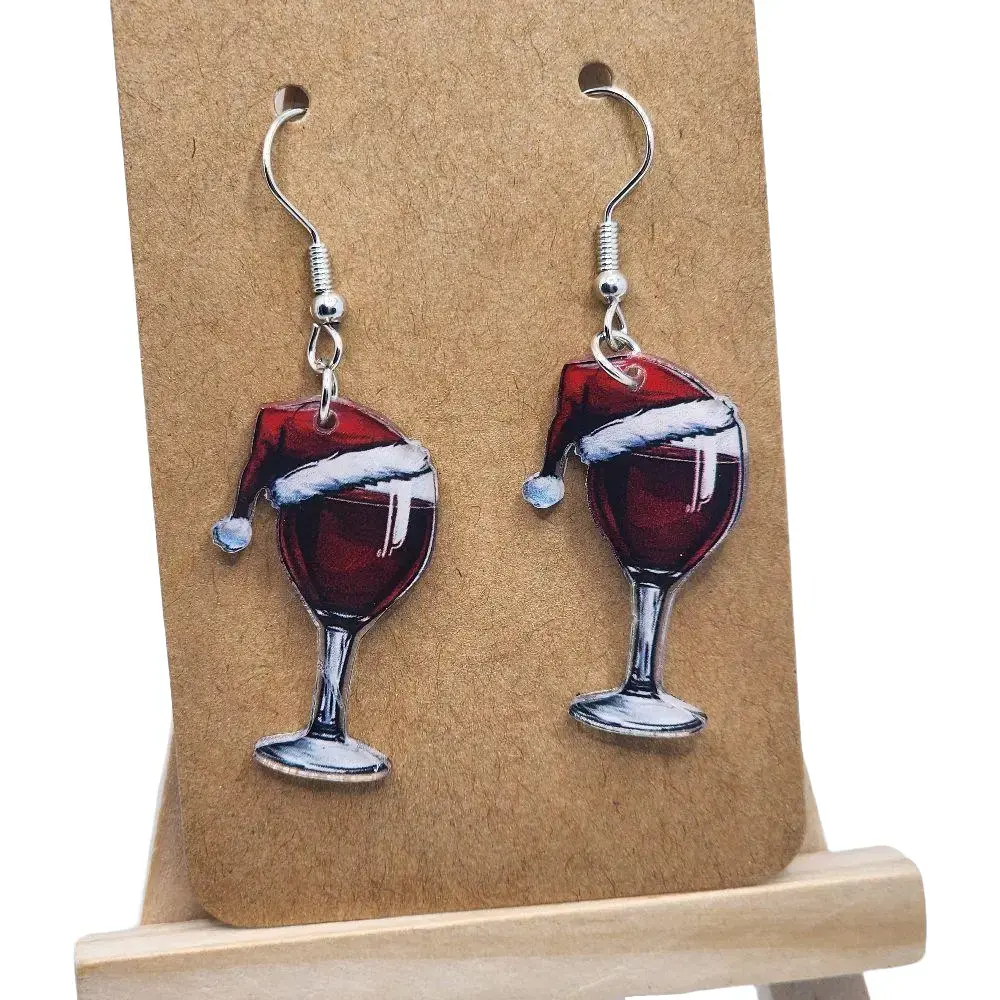 Cute And Sexy Christmas-Themed Acrylic Earrings Shaped Like Red Wine Glasses with Santa Hat Accents and Clear Base Hook Earrings