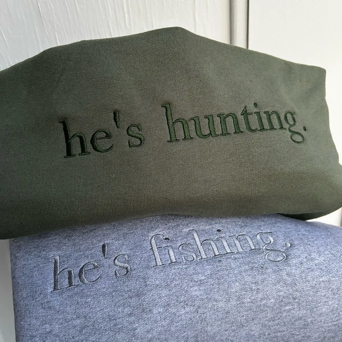 Embroidered "he's fishing" "he's hunting" trendy and minimalist monochromatic crewneck neutral