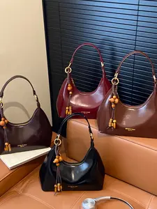 Vintage texture luxurious crescent armpit bag, decorated with gourd wood bead string ornaments, versatile shoulder bag, Crossbody bags, that can accommodate mobile phones and lipstick, suitable for commuting, shopping