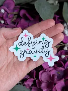 Defying Gravity Vinyl Waterproof Sticker | Pink and Green Wicked Sticker | Wicked Sticker for Laptop, Waterbottle | Elphaba and Glinda