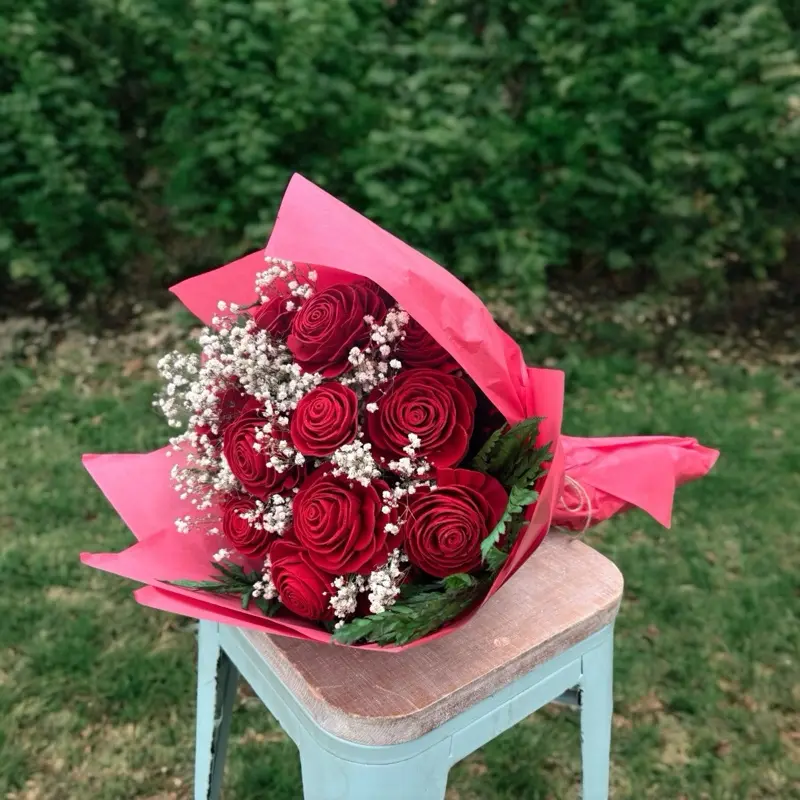 Wood Roses with Dried Babies Breath and Preserved Greens. Choose your color. Centerpiece for your home. Will last forever!