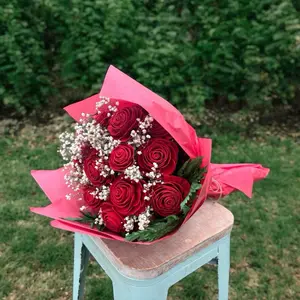 Wood Roses with Dried Babies Breath and Preserved Greens. Choose your color. Centerpiece for your home. Will last forever!