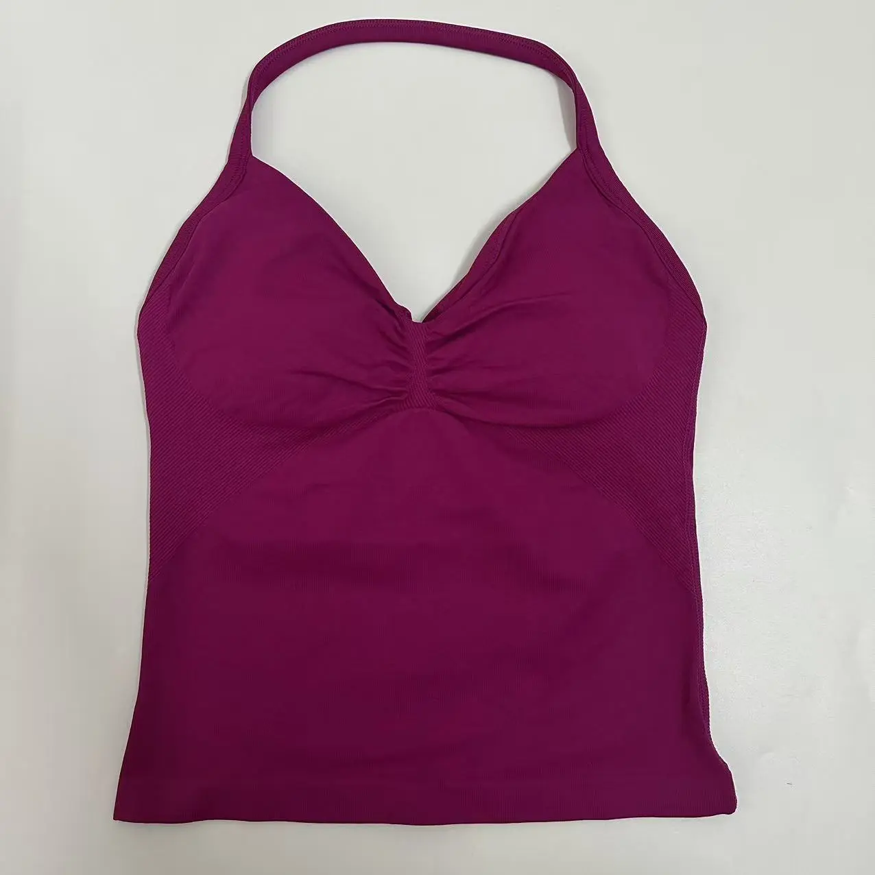 DFYNE Backless Fitness Tank Top with Built-in Bra Pads, Long Straps, and Elongated Cuffs for a Slimming Look, Ideal for Yoga Training. DFYNE Backless Fitness Tank Top with Built-in Bra Pads, Long Straps, and Elongated Cuffs for a Slimming Look, Ideal for Yoga Training.