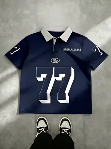 Vintage Graphic Polo Shirt Men Women - Y2K Streetwear Number 77 Print Top, Retro Racing Style Collar Tee, Oversized Aesthetic Apparel, Breathable Sports Casual Outfit, IRREPLACEABLE Slogan Fashion, Black Short Sleeve Hip Hop Clothing