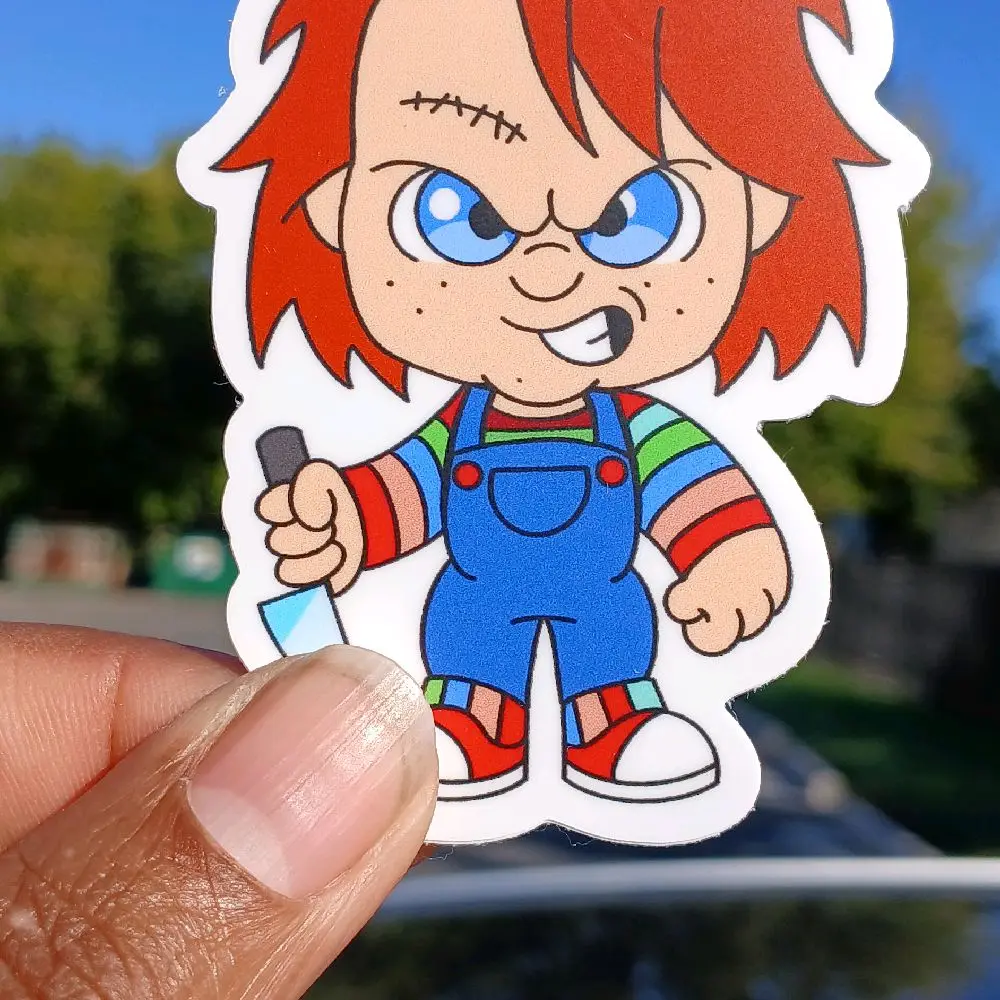 Chucky Childs Play Sticker with Iconic Red Hair and Blue Overalls for Fans of Classic Horror Movies