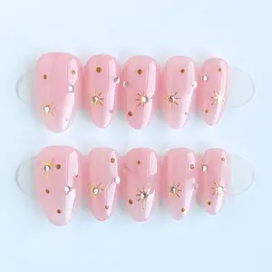 10pcs Handmade Press On Nails Acrylic - Short Almond Light Pink Nails, Stylish Nail Tips, Handcrafted Charming Embellishments Gold Starburst & Rhinestone Dot Decor Sweet Elegant Style, for Dating & Daily Wear with Jelly Glue & Nail File