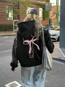 Women's Graphic Long Sleeve Hoodie with Cross Bowknot Print, Loose-Fitting Fall Winter Fleece Lined Pullover, Casual Everyday Fashion Pocket Sweatshirt