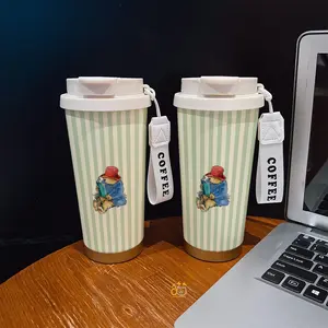 Coffee mug ~ 530 ml / 17.92 oz insulated mug，Paddington Bear Reading Book Blue Coat Red Hat Pattern PrintDouble-walled, leak-proof, travel mug with handle; perfect for coffee lovers, art enthusiasts, sports enthusiasts, and those seeking a gift.