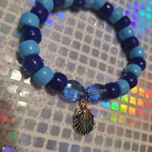 Light Blue and Dark Blue Pony Bead Bracelet with a Seashell Charm Jewelry Accessory