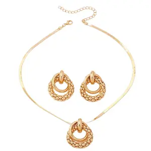 Light luxury snake bone chain jewelry set with a round hoop pendant. Two-piece set: gold hoop necklace and earrings—versatile, elegant accessories.