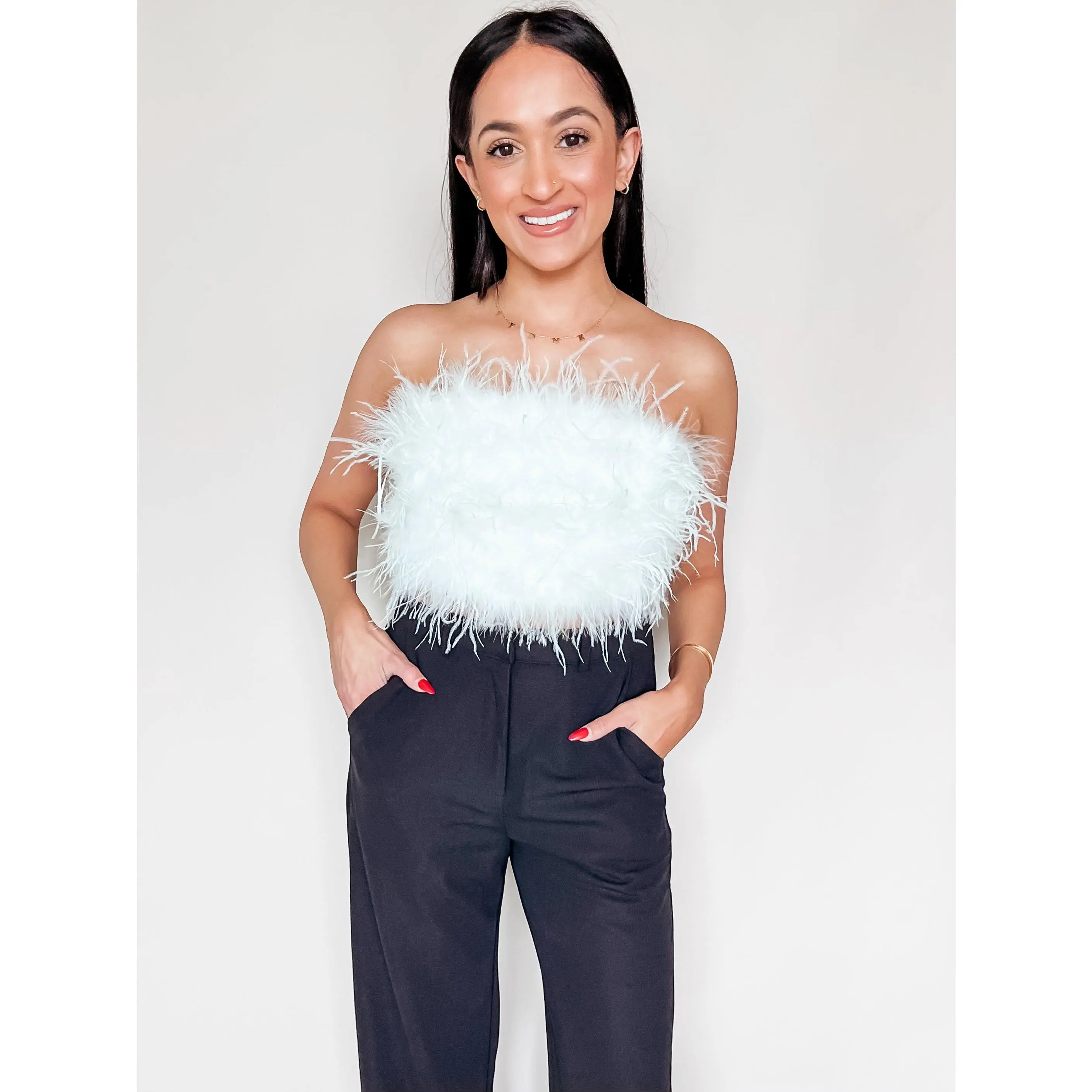 TURN HEADS FEATHER TOP