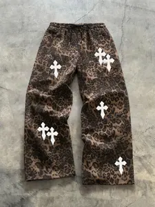 Unisex street style cross-stitch embroidery leopard print pants, Casual streetwear trousers, relaxed fit, adjustable drawstring waistband, comfortable design, Perfect for casual daily wear, stylish leopard print outfits suitable for hip-hop