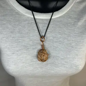 Peach Moonstone Copper Pendant with Unique Wire Wrapped Design for Stylish Jewelry Lovers